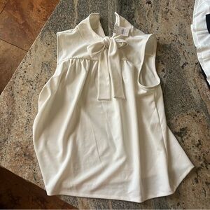 White Ann Taylor top with a bow